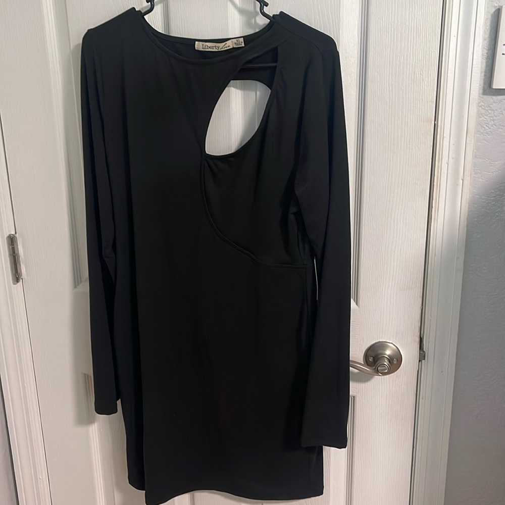NWT Black peekaboo dress in front and open O back long sleeve